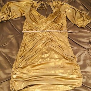Bebe fancy gold dress size medium.